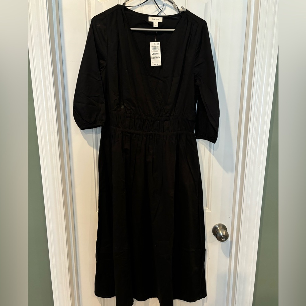 NWT just below knee spring/summer/fall dresses with pockets. On 34th
